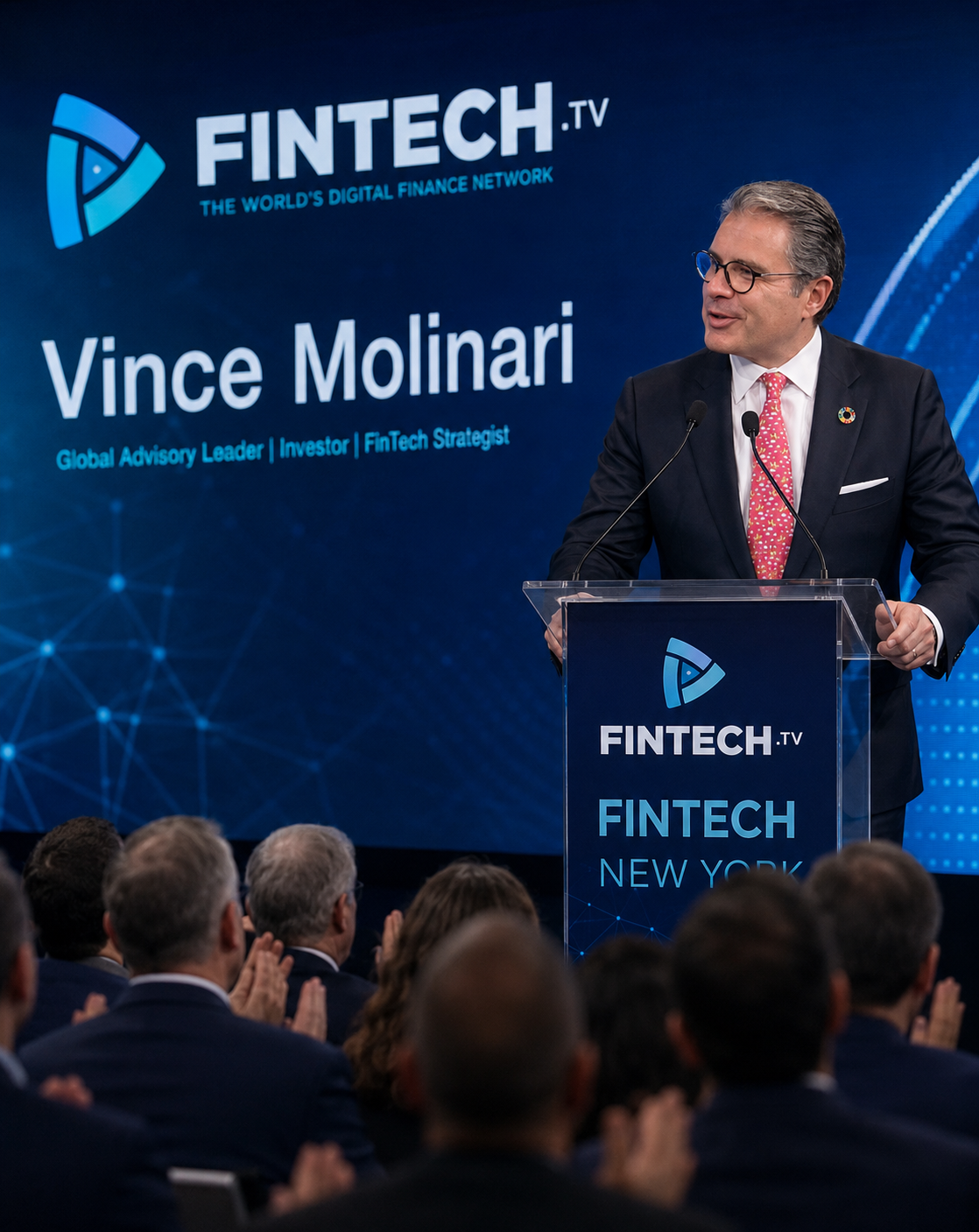 Vince Molinari speaking on stage at a global finance and fintech conference
